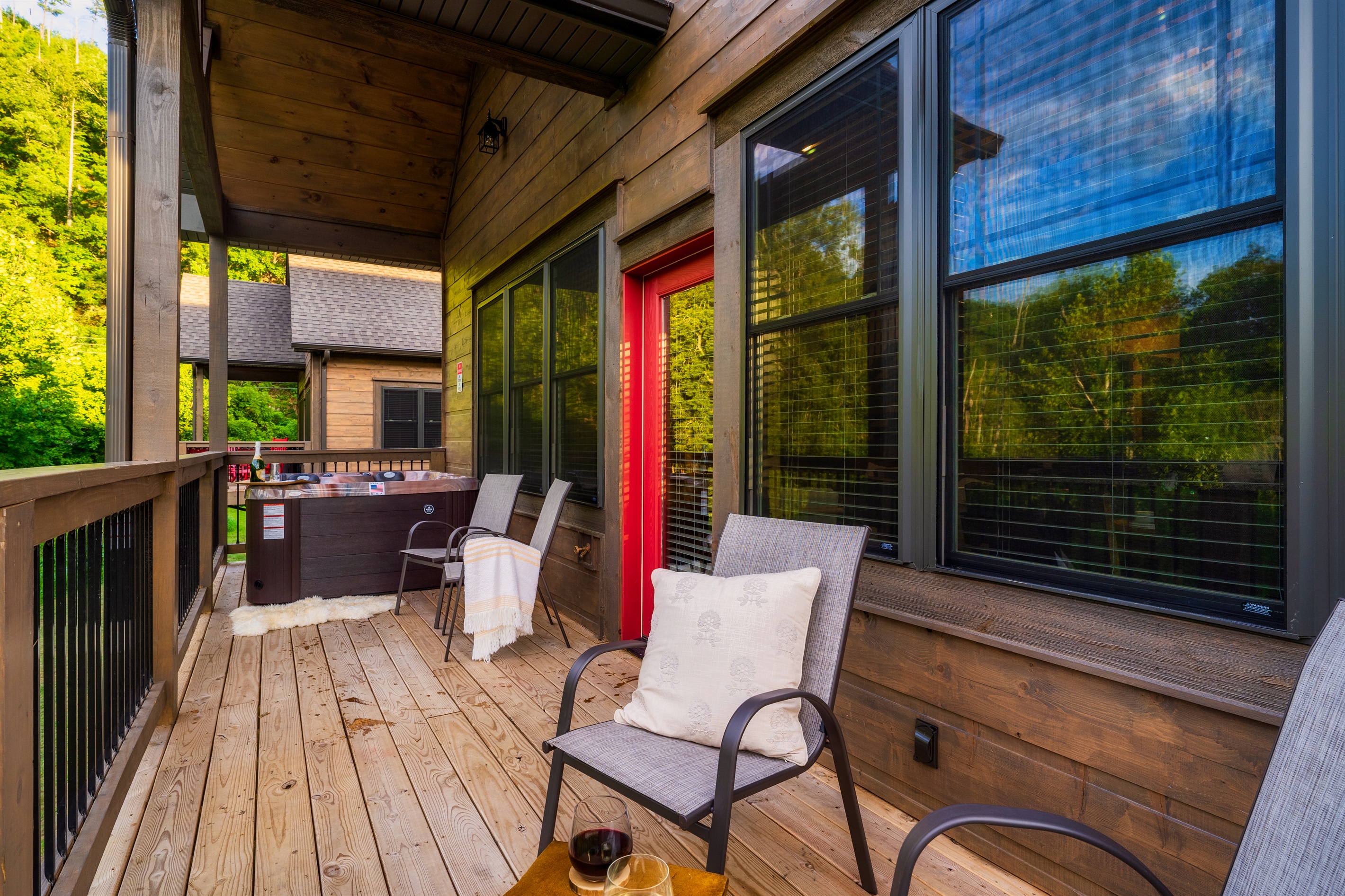 Private hot tub and seating areas on deck.
