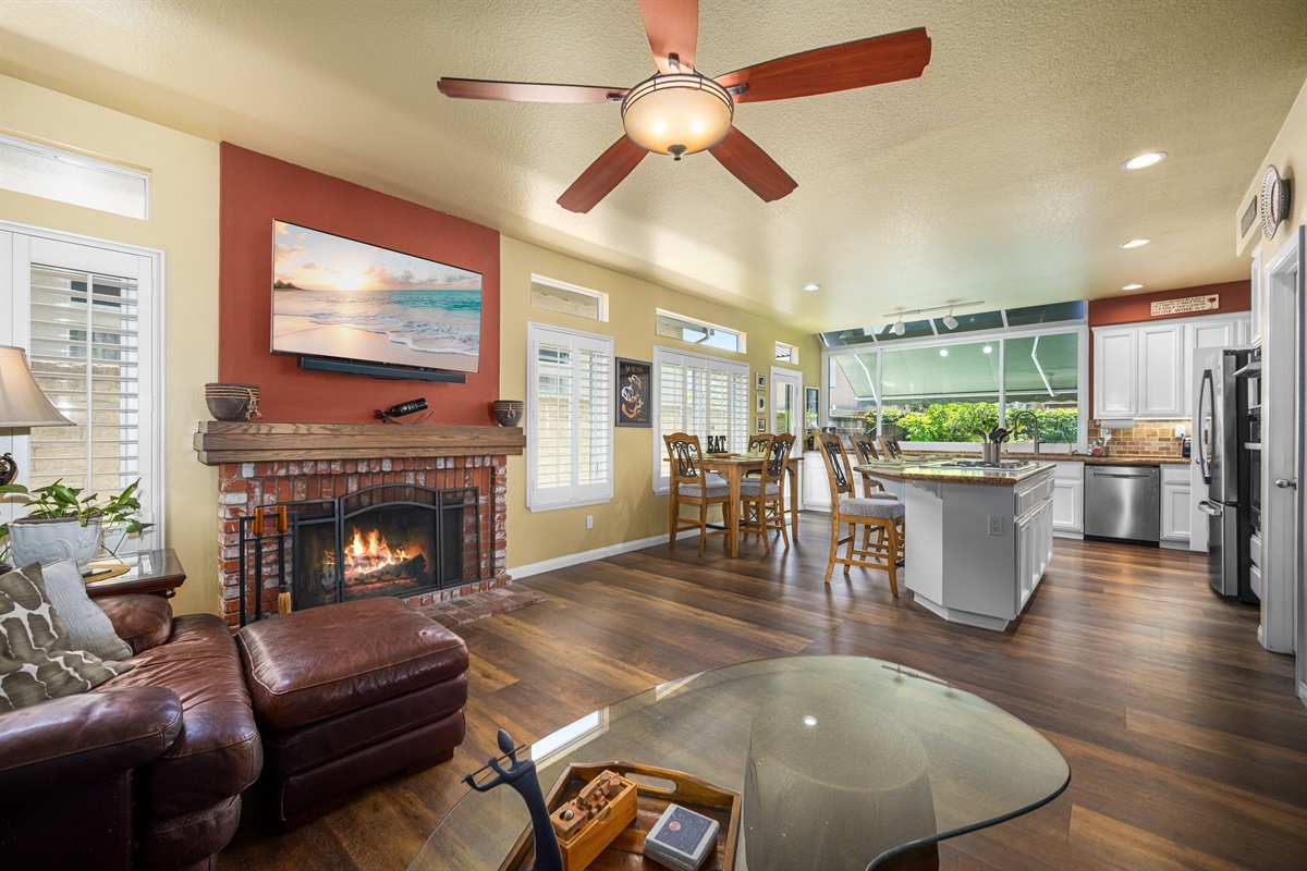 Family Room, T.V. and Fireplace (Remote control candles only, not a gas or wood burning fireplace).