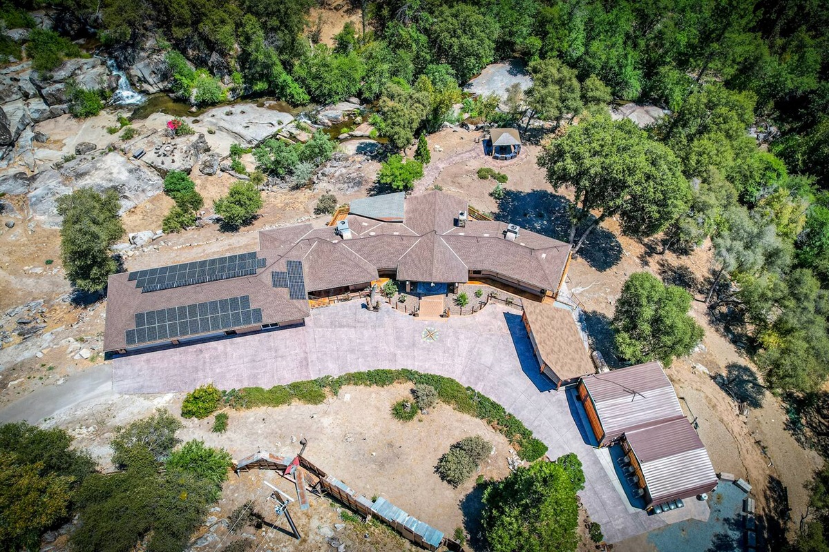 View of the property, solar panels are on the garage which is only partially included in my listing - game room