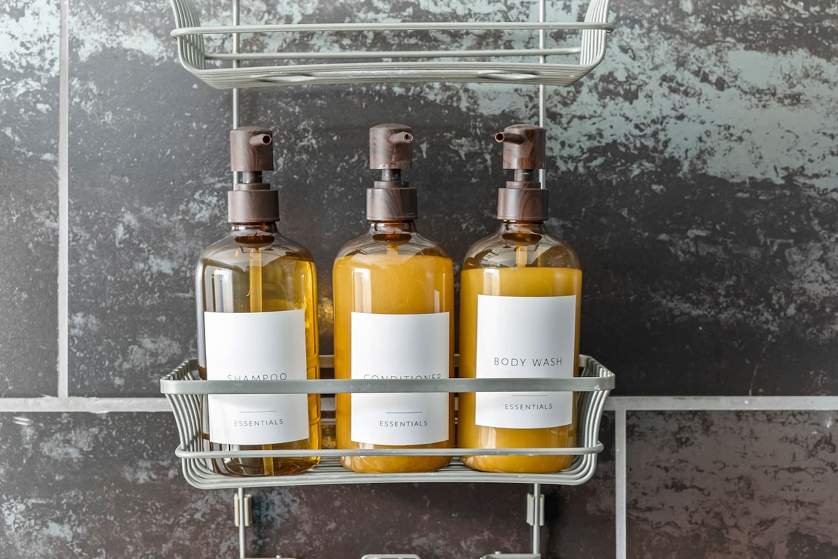 Shampoo, conditioner, and body wash provided for a hotel-like stay.