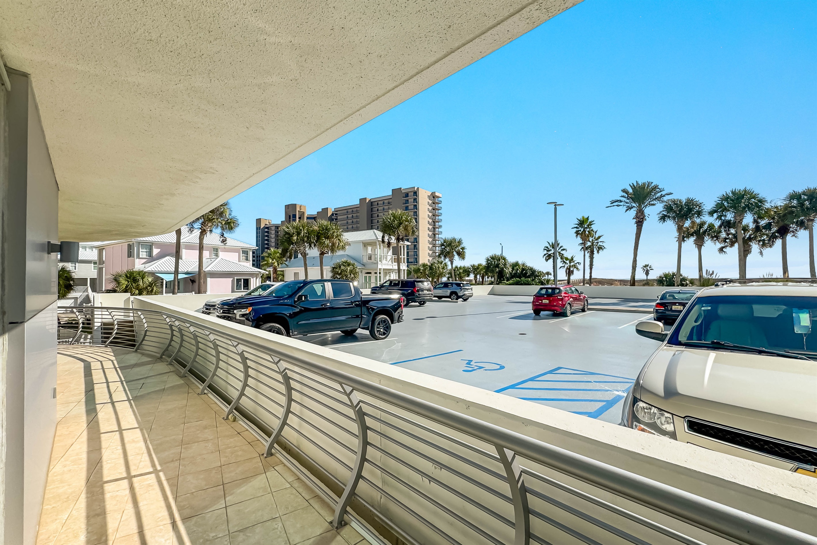 Effortless beach access begins here. Enjoy dedicated parking and a sun-drenched day at the coast.