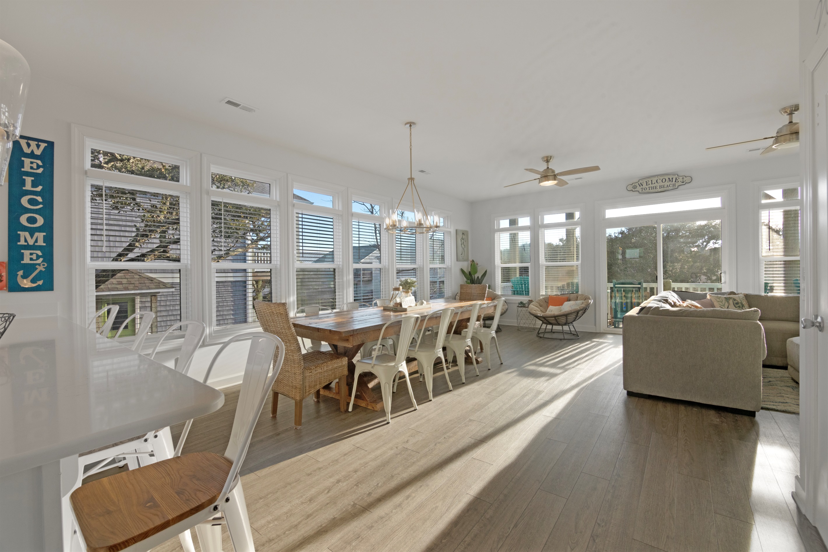 This bright open-concept living area is designed for relaxing, gathering, and creating memories together