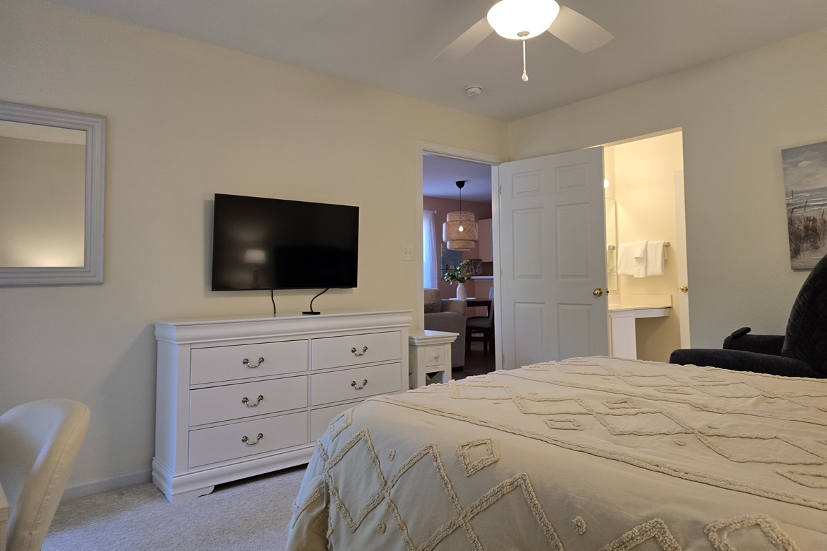 Mounted Flatscreen TV with Dresser Storage
