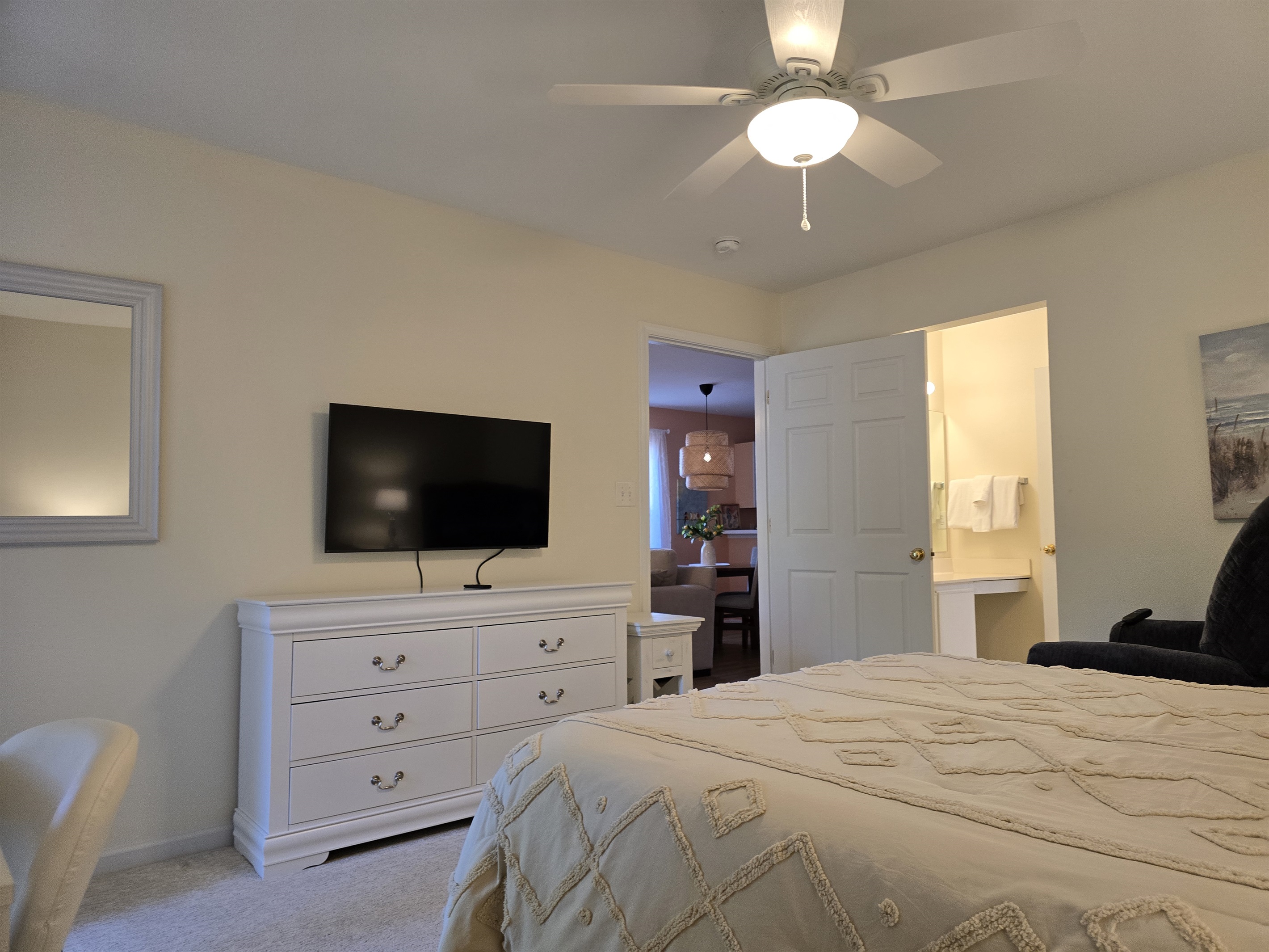 Mounted Flatscreen TV with Dresser Storage