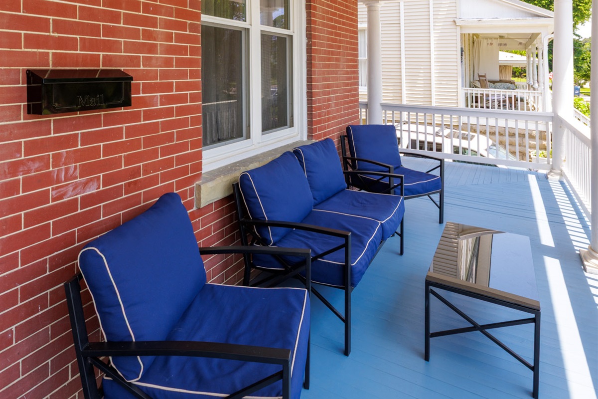 Large Wrap around porch with privacy around the corner if a guest is to stay in the other unit.