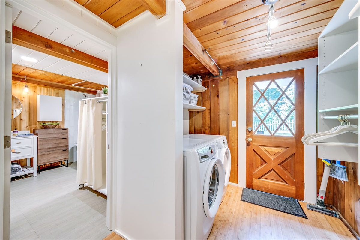 Back entry from the outdoor shower area. You can access the laundry room and downstairs bathroom without traipsing through the living room and dining room. Very handy when you have just rinsed off after returning from the beach.