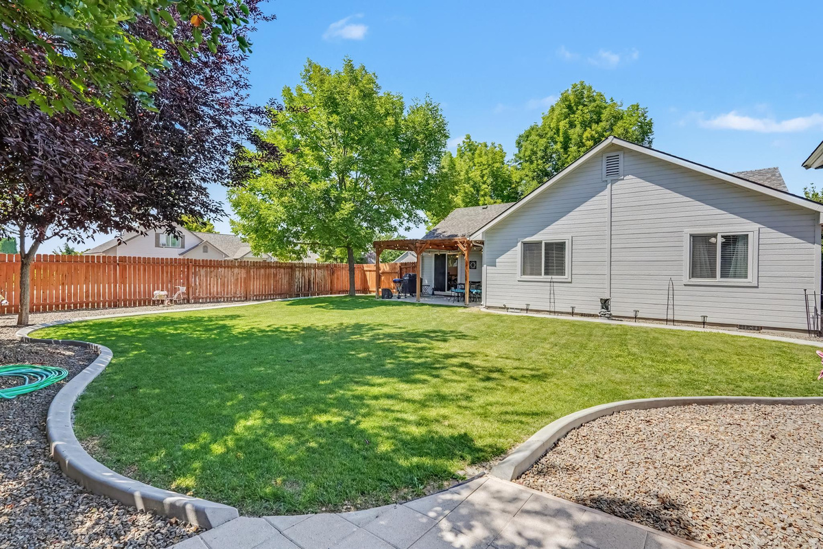 The spacious backyard offers plenty of room for outdoor games, activities, and quality time with family and friends. It’s the perfect place to relax, have fun, and create lasting memories together.
