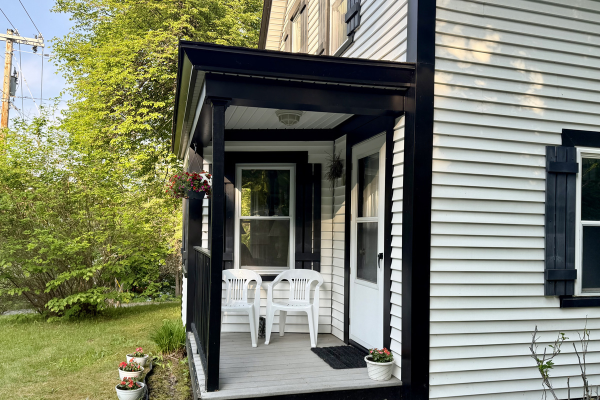 Unwind on the covered front porch after an unforgettable day in Acadia. This quiet, shaded spot is ideal for breathing in the fresh coastal air, reading a good book, or enjoying the peaceful historic neighborhood surroundings.