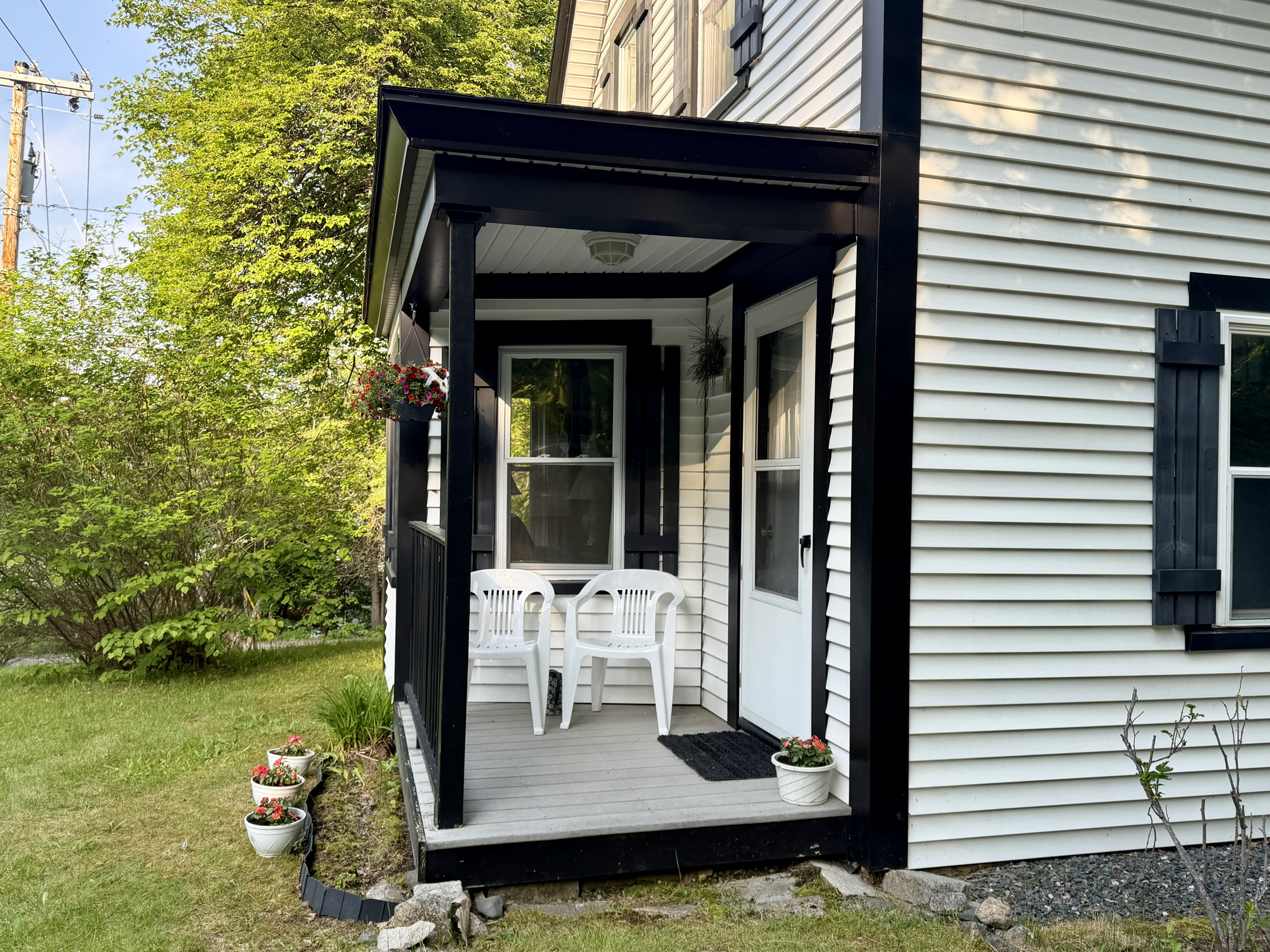 Unwind on the covered front porch after an unforgettable day in Acadia. This quiet, shaded spot is ideal for breathing in the fresh coastal air, reading a good book, or enjoying the peaceful historic neighborhood surroundings.