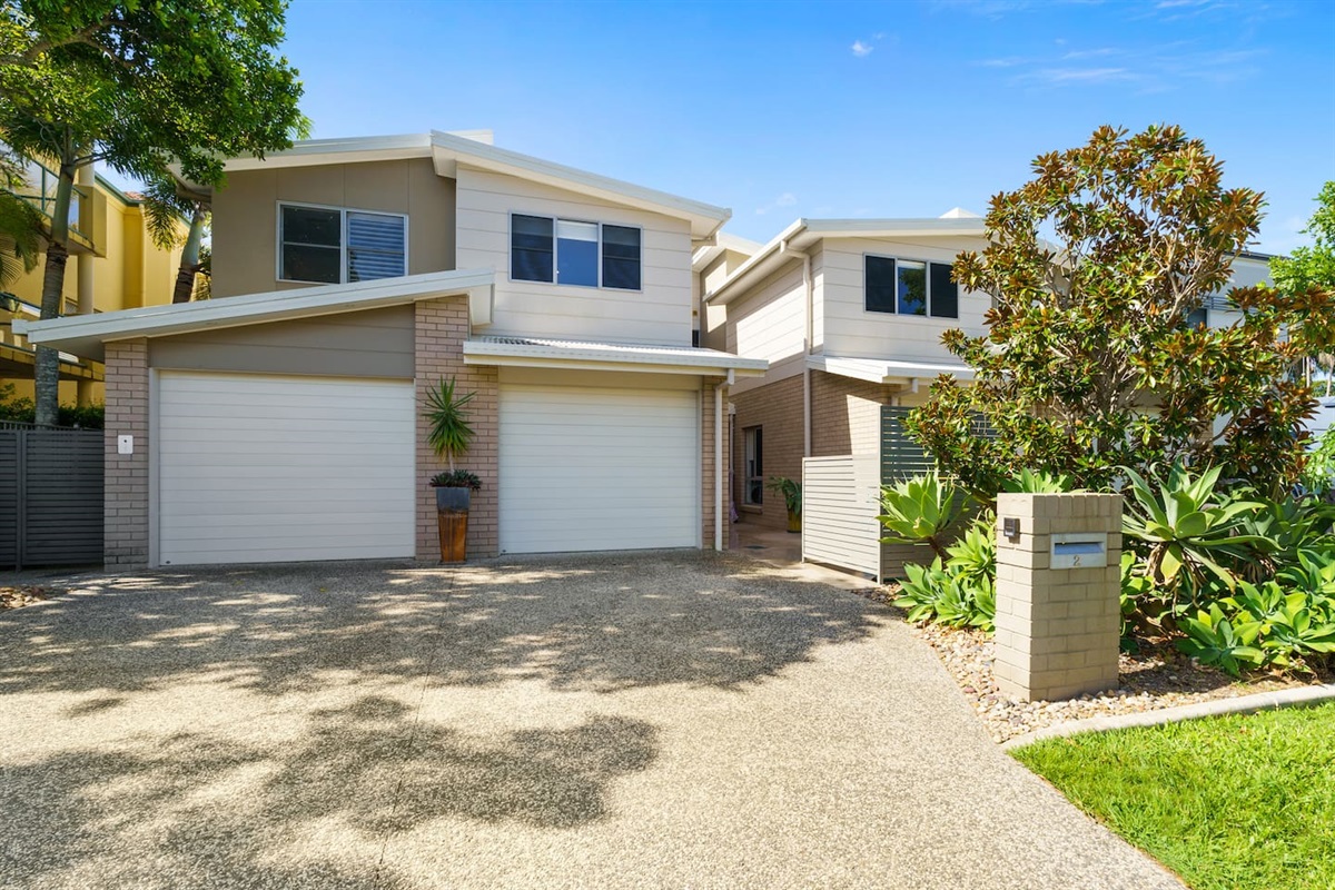 Easy access from the street to the house via garage. Parking for 2 cars