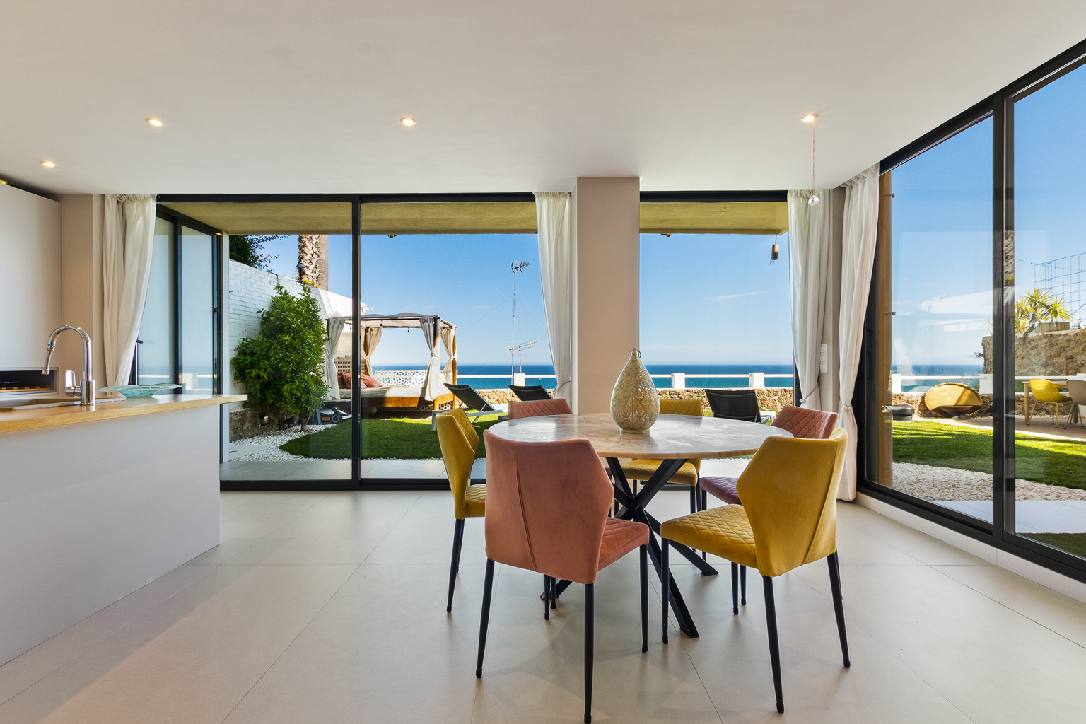 Bright open-plan living and dining area opening to the garden