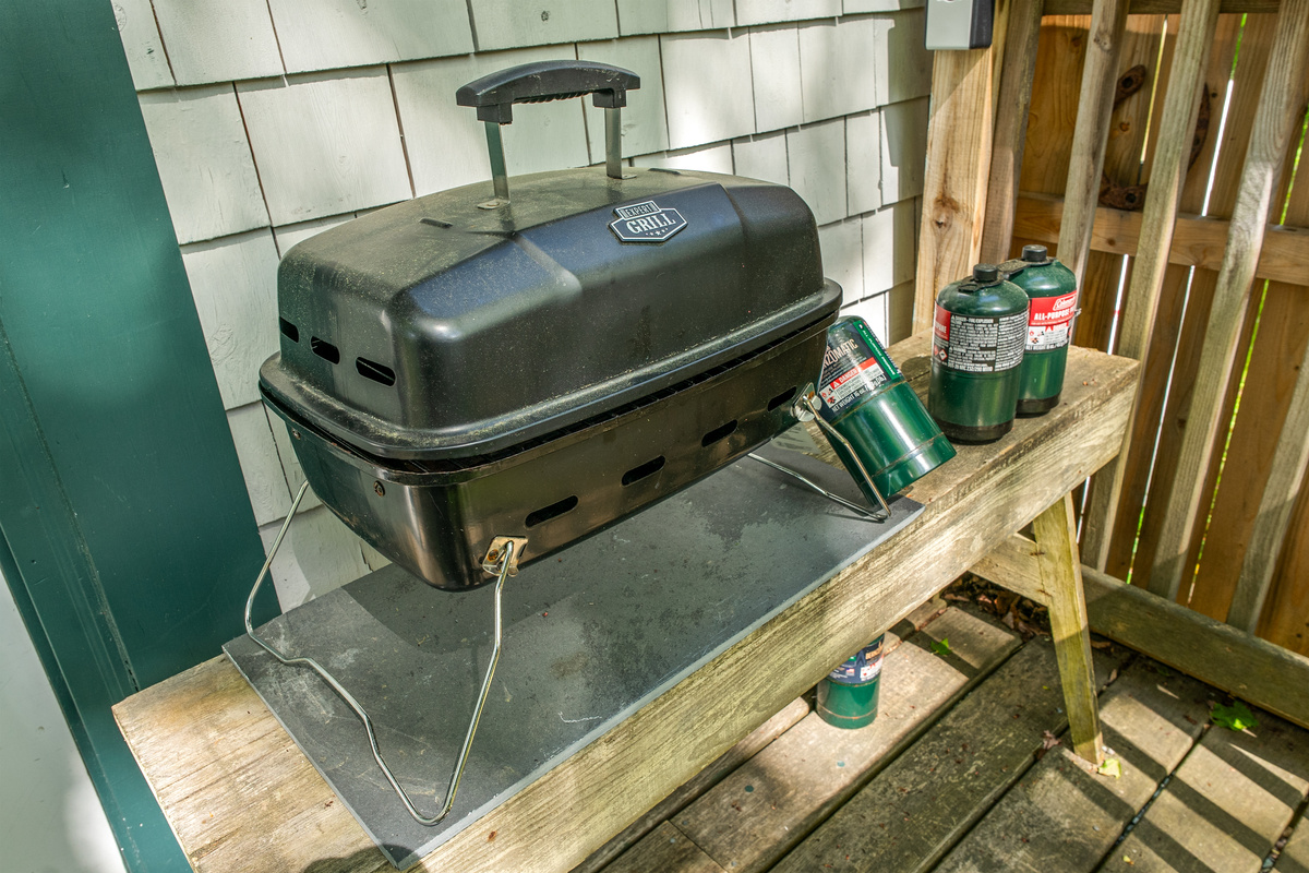 Deck side grilling made simple. We provide the propane tanks and a secure stone cooking pad on the deck for an easy post-hike dinner. Fire up the grill, relax, and unwind after a successful day of exploring Acadia.
