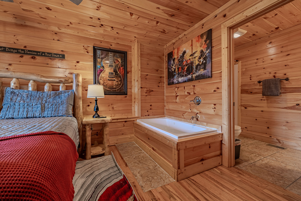 Located near the theater and lower deck, The Rhythm Suite gives guests a private place to relax after movie night or hot tub time.