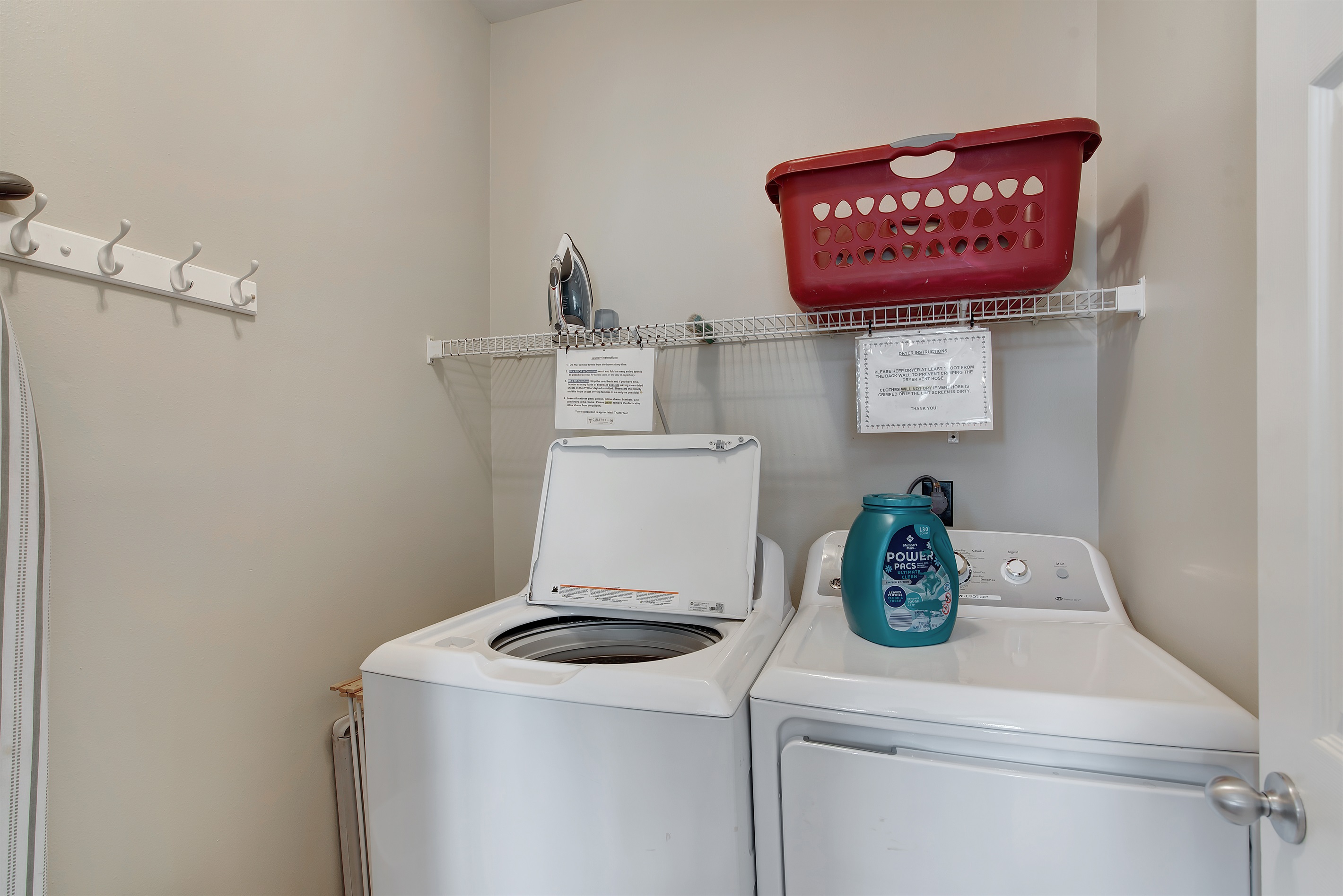 Laundry area with full‑size washer and dryer