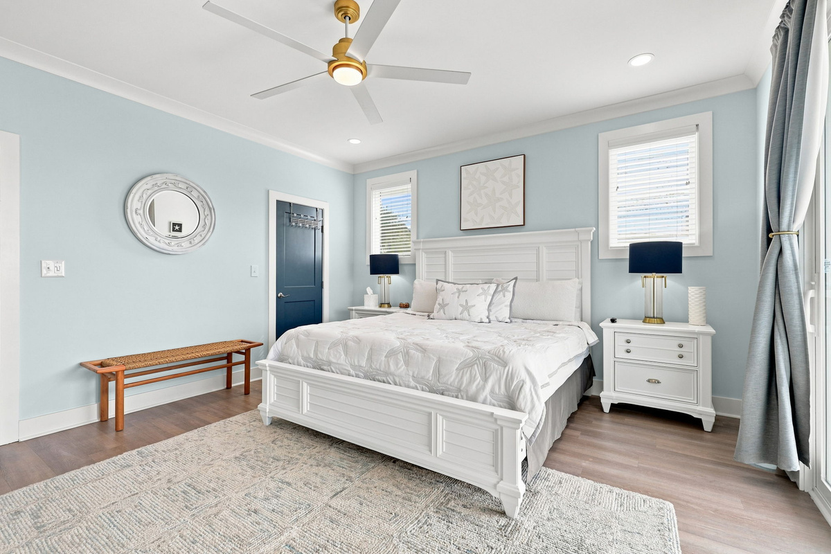 A serene coastal-inspired retreat featuring a luxurious king bed, soft neutral tones, and elegant d&eacute;cor designed for a peaceful night&rsquo;s rest. Enjoy natural light, a private balcony, and beautiful views that create the perfect place to unwind after a day by