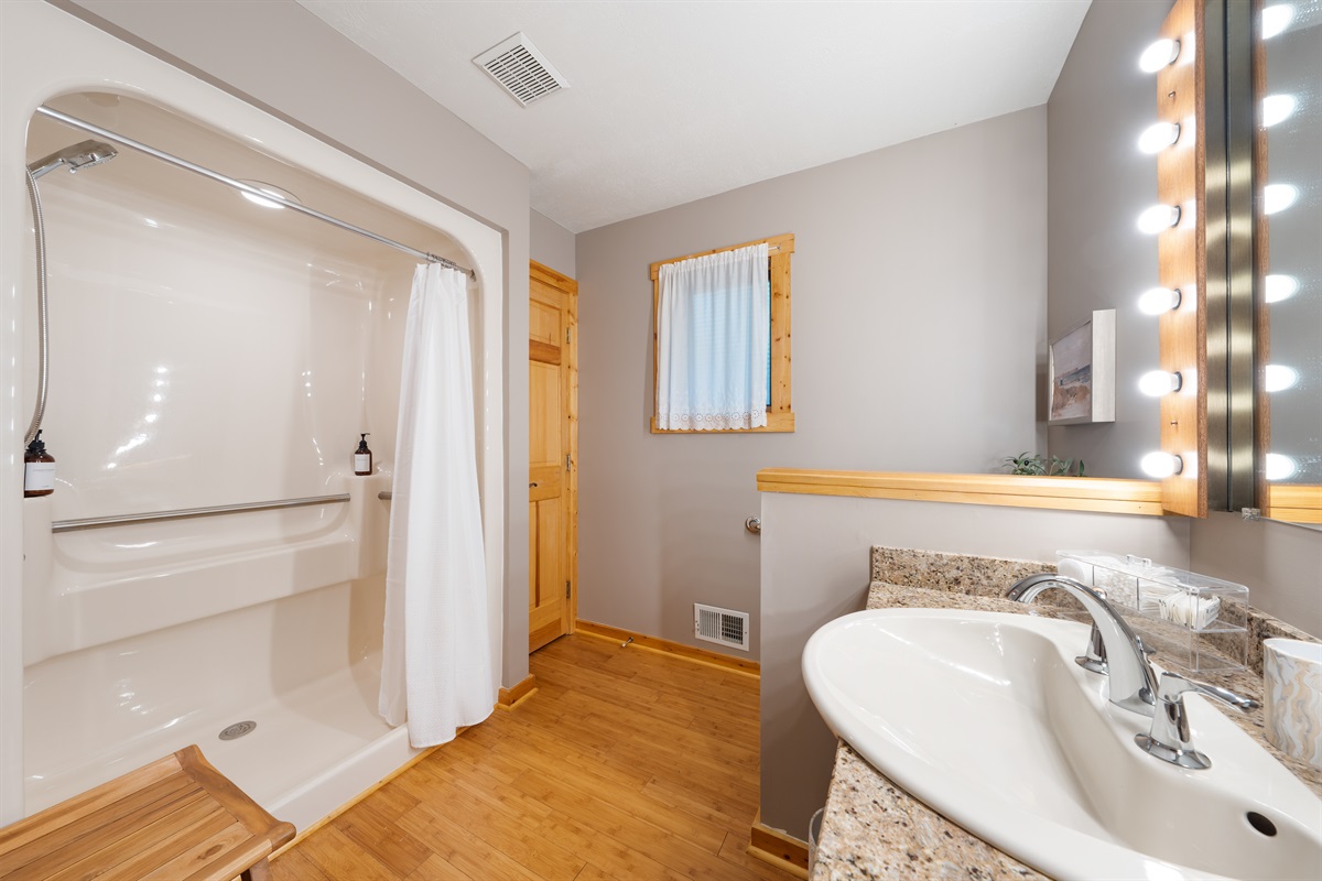 The main bath has a large shower and plenty of towels to use during your stay. Amenities include shampoo, conditioner, body wash, hand soap and more. 
