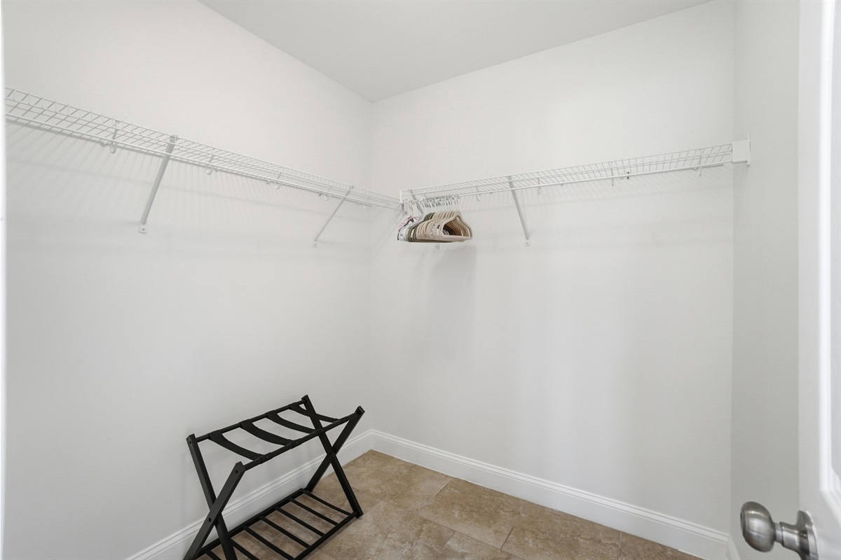 Huge master closet with plenty of clothing space