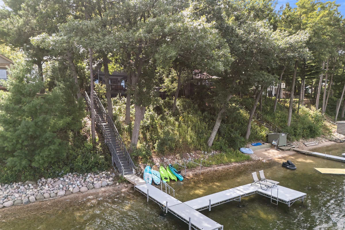 Stretch out on the two lounge chairs at the end of the pier—the perfect spot for sunbathing by the water.