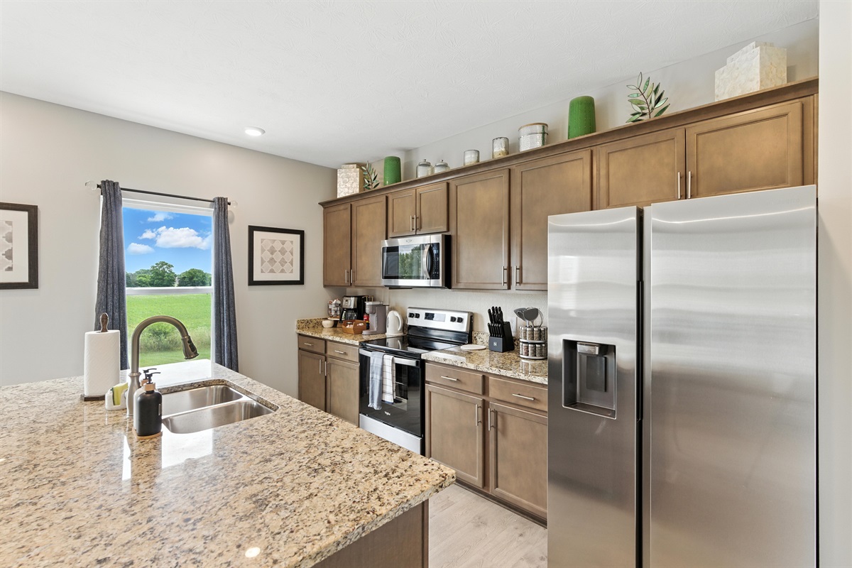 Well appointed kitchen with fridge and all the essentials