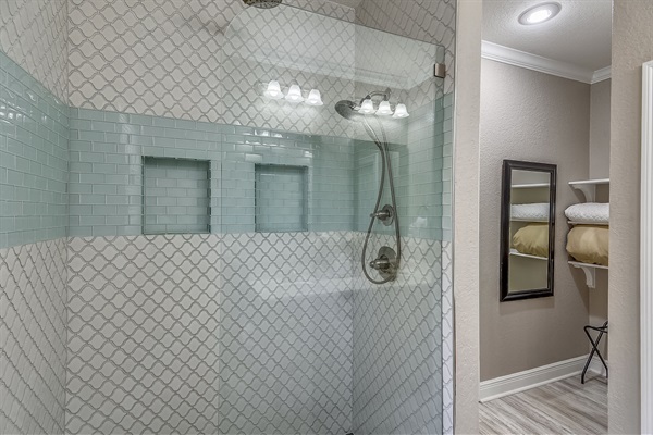 Lovely walk in shower located in master suite