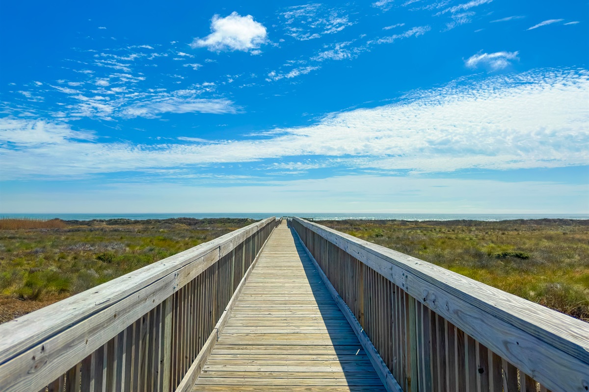 The boardwalk is steps from the condo and take you right to the beach.