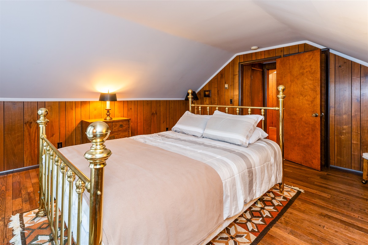 Queen bedroom main house upstairs with a lake view