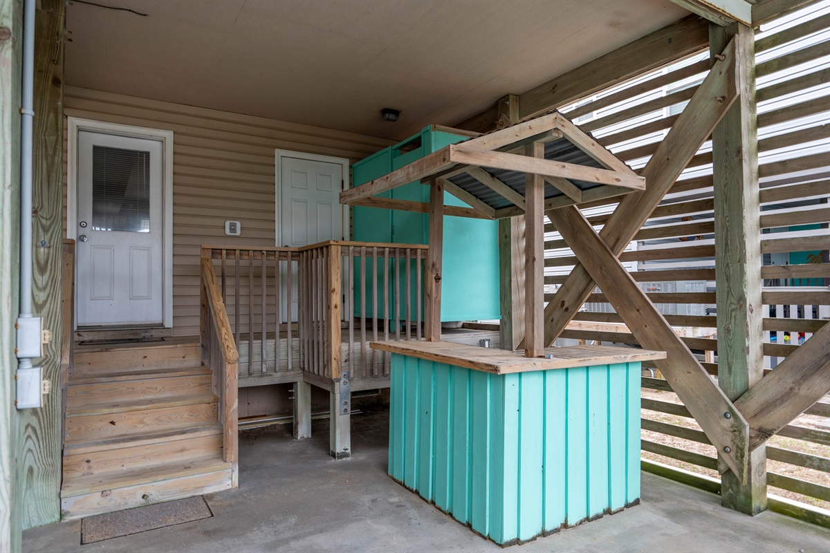 Fun backyard tiki bar—perfect for relaxing with a drink.