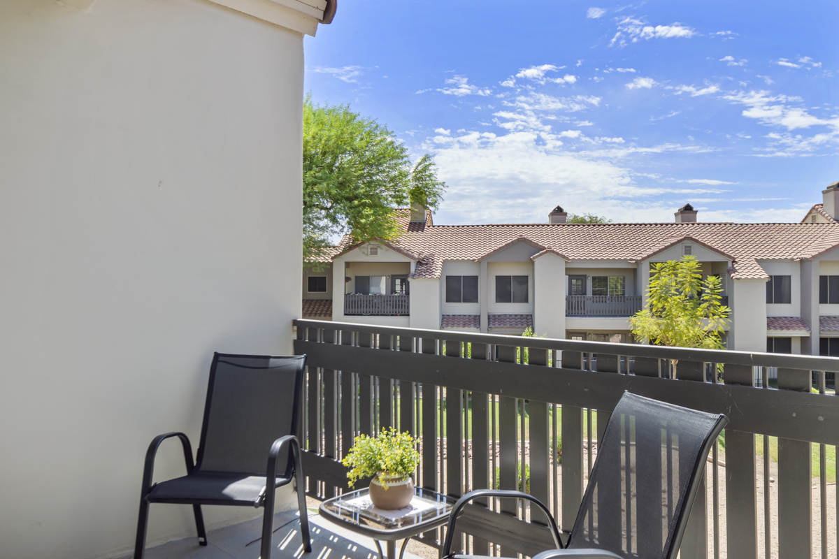 Step outside onto the private balcony and enjoy a peaceful outdoor space overlooking the beautifully maintained community grounds.