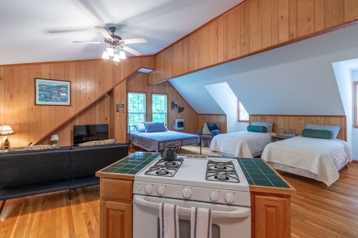 Spacious Studio: Enjoy a charming blend of comfort and style with vibrant wood accents!