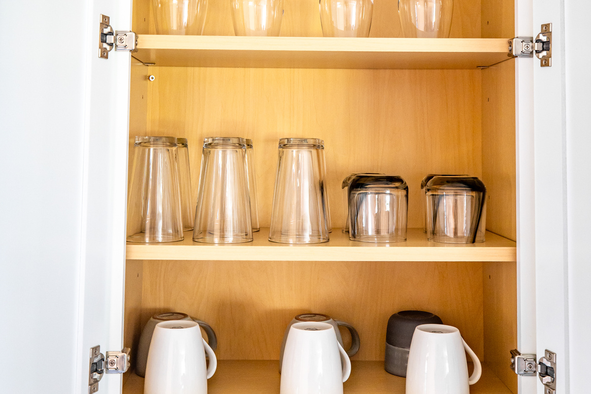 Fully equipped kitchen with refrigerator, stove, oven, microwave, dish washer.