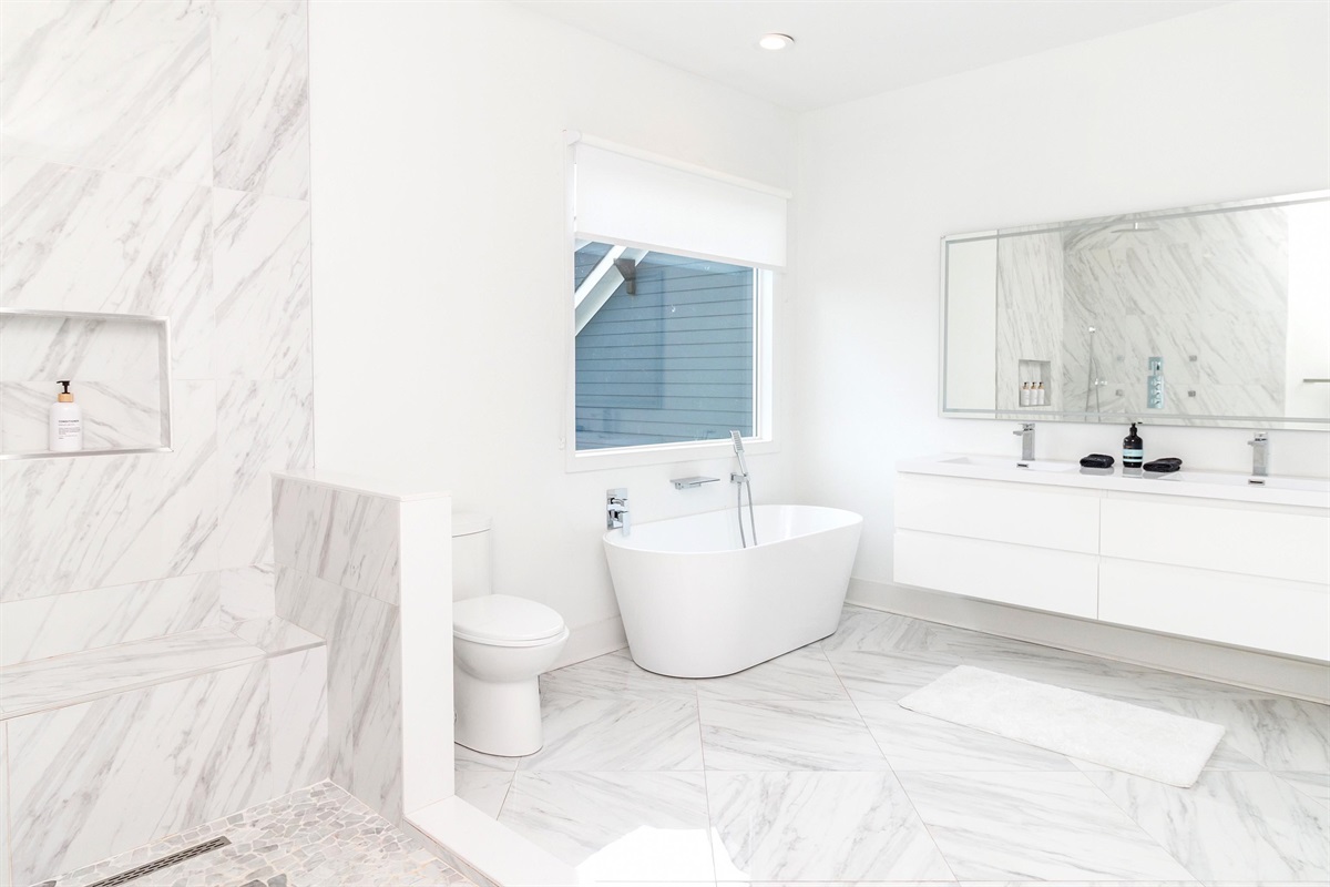 Relax and rejuvenate in this luxurious white-themed bathroom. Soaking tub and walk-in shower. Why choose?