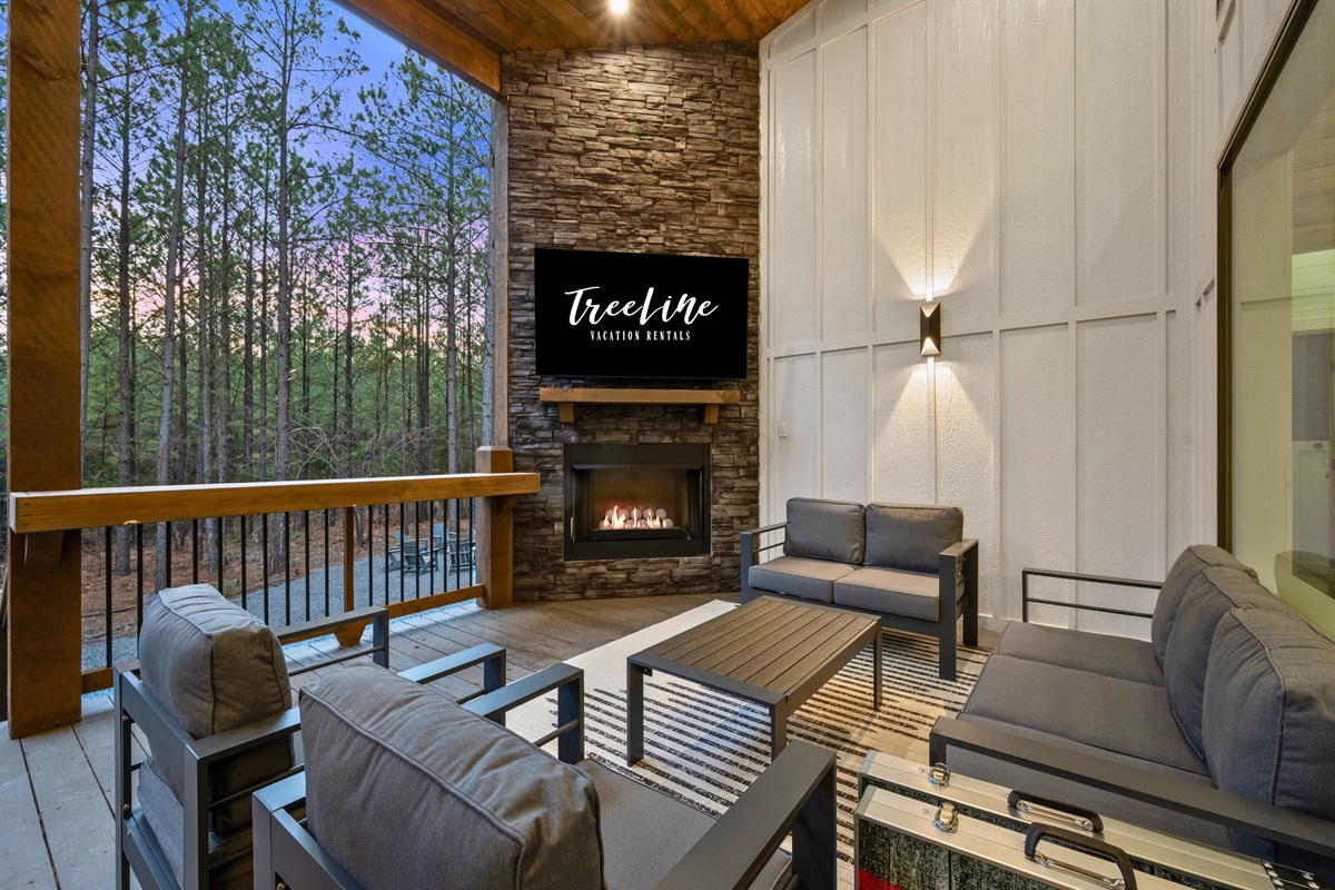 Comfortable outdoor seating creates a welcoming place to enjoy fresh air, good conversation, and peaceful forest views.