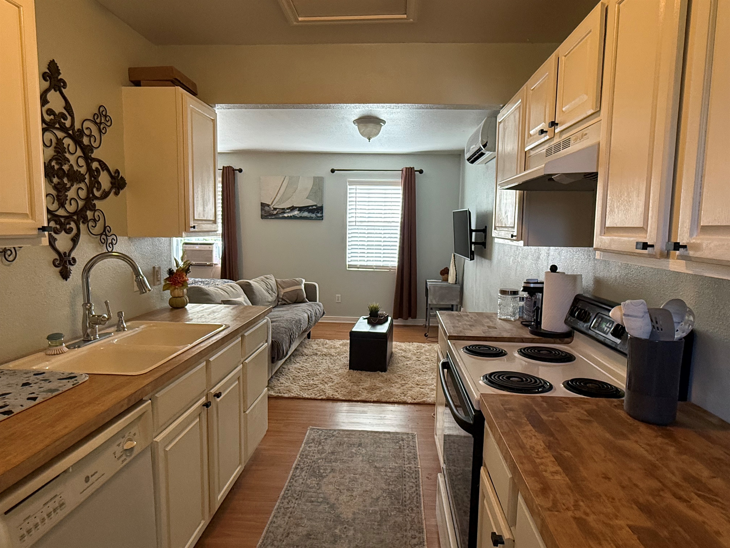 Compact kitchen perfect for light cooking.