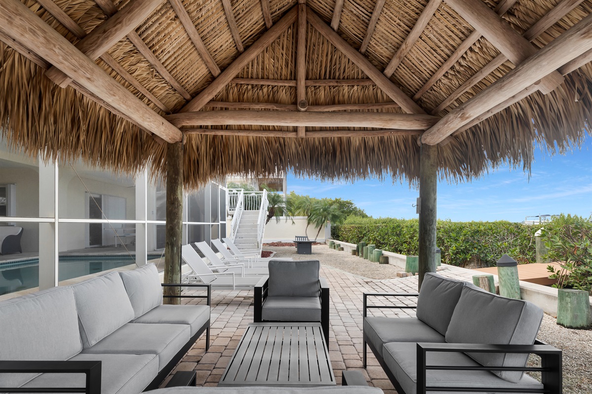Lounge area under tiki hut
