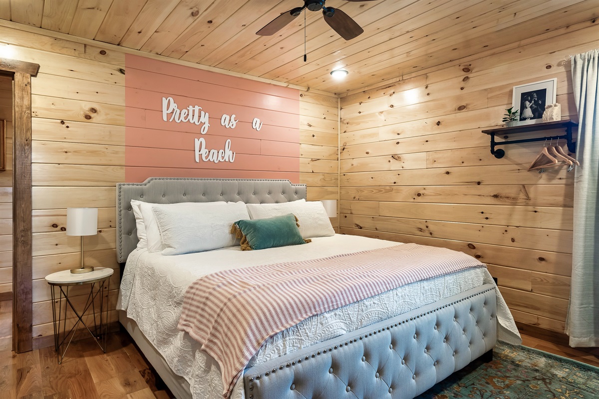 The "Pretty as a Peach" king bedroom (upstairs) has a private bathroom