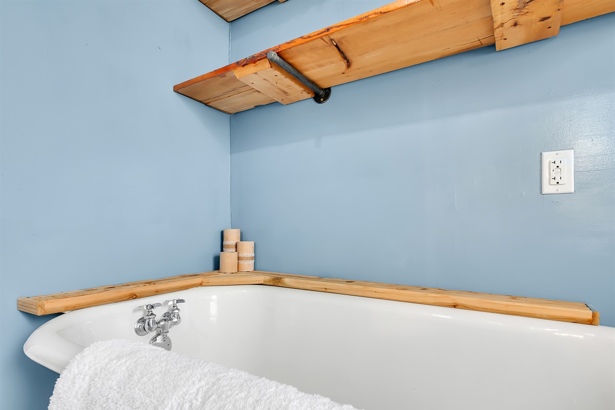 Custom made shelving around tub