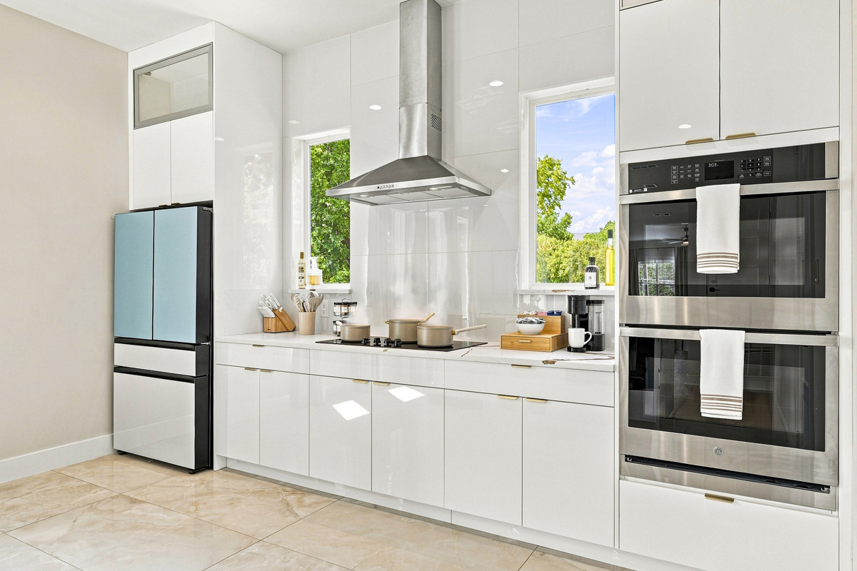 Cook like a pro in this sleek space with modern appliances and bright views!