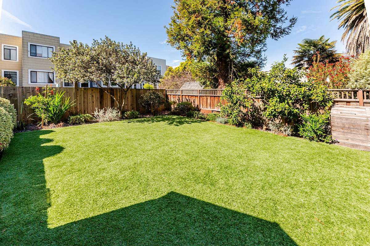 Lovely, manicured garden space to enjoy the outdoors. Please note this space is shared with upstairs residents and their incredibly friendly, cuddly Labrador named Simba. 