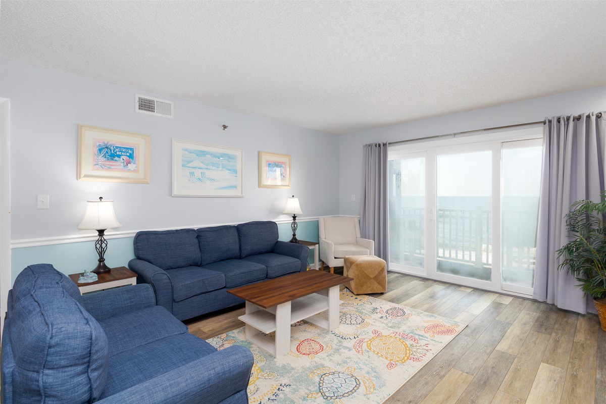 Comfy seating in the living area with a view worth staying in for