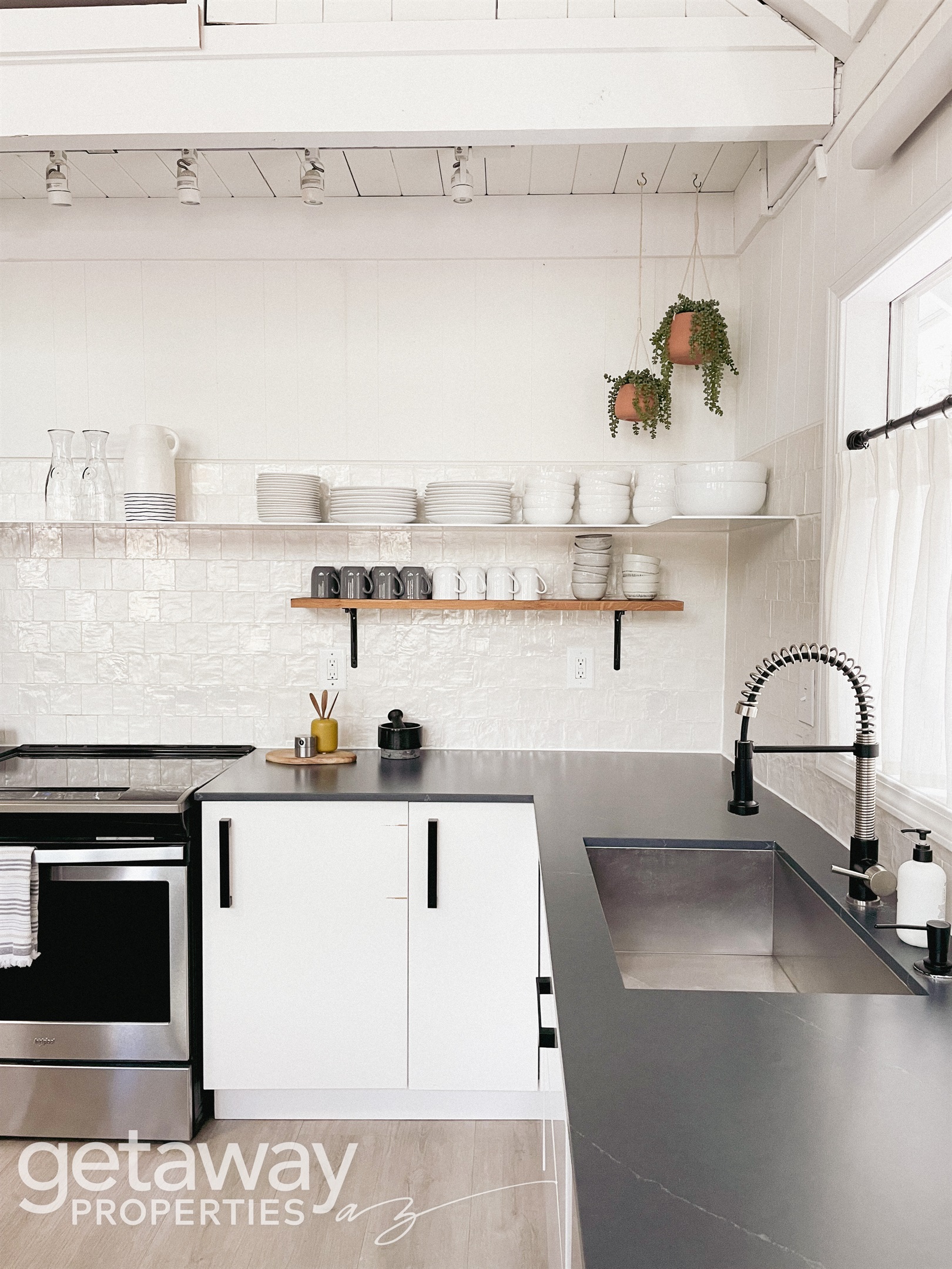 Fully equipped kitchen with modern appliances and island dining for family meals