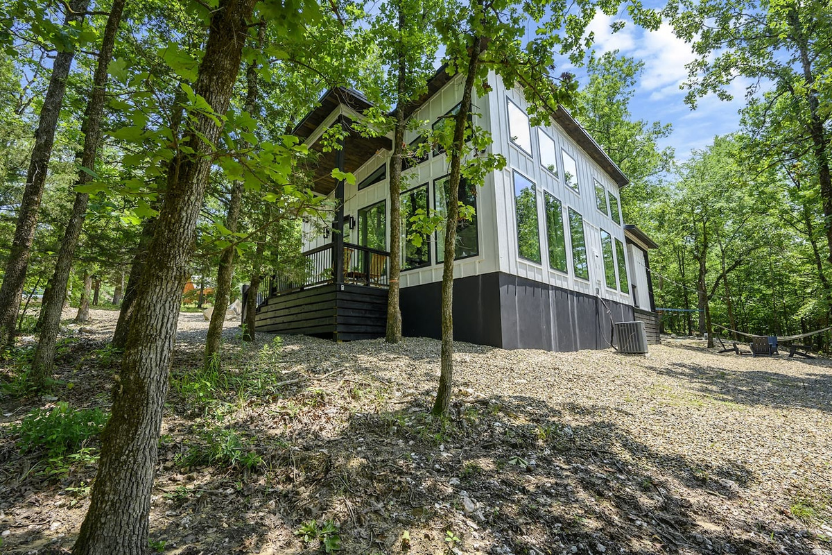 Snuggled amongst the trees, offering a peaceful retreat surrounded by nature.