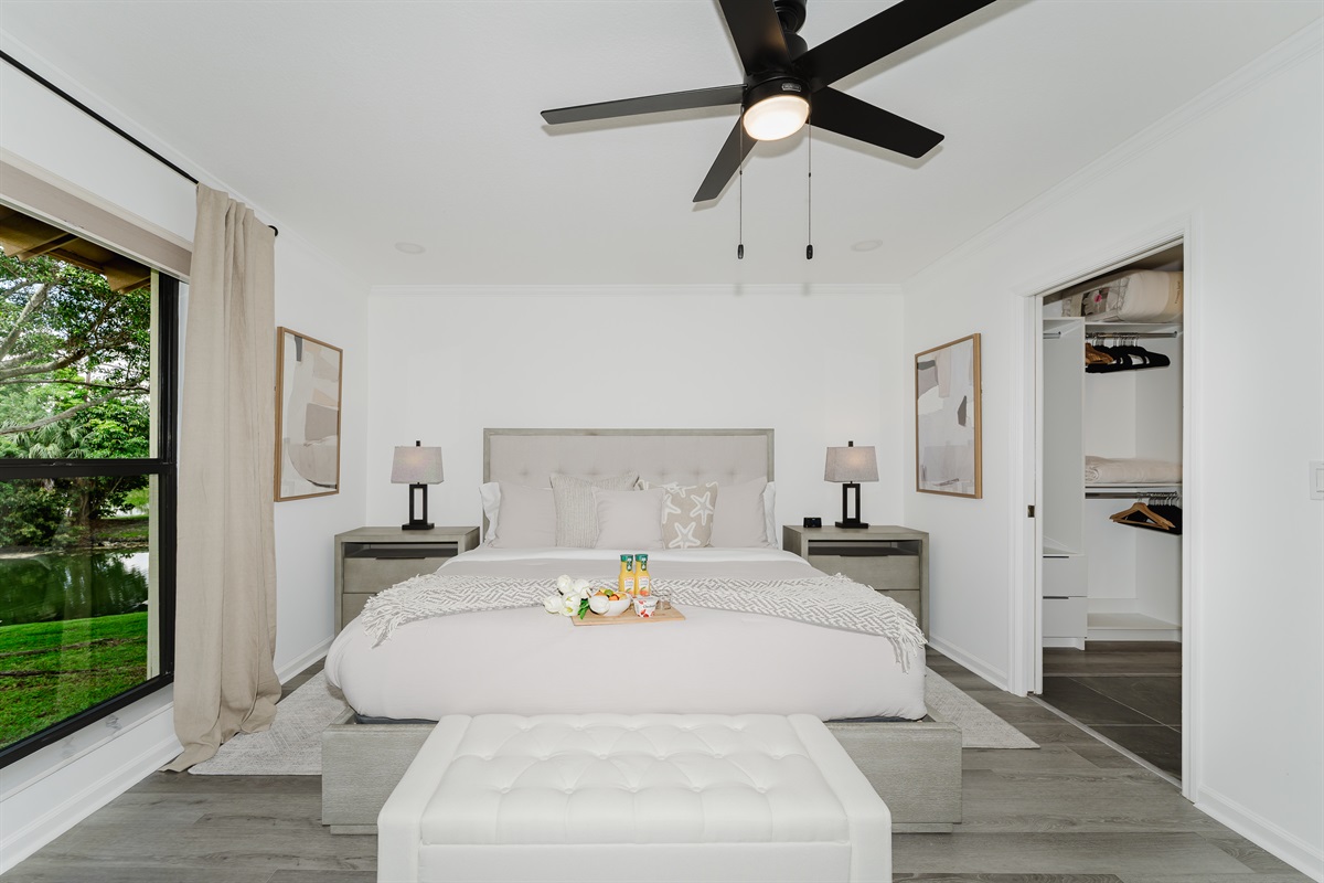 Spacious primary suite with a comfortable king bed and a serene atmosphere. Relaxing retreat designed for restful nights and peaceful mornings. Thoughtfully designed bedroom with hotel-quality comfort