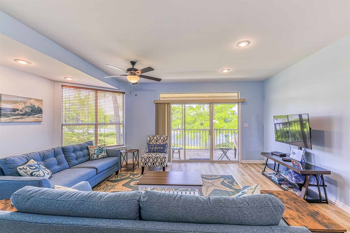 Living Room: Bright and airy space with a view, perfect for relaxation and family gatherings!