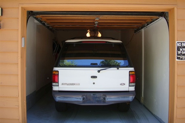 Convenient garage accommodates small and narrow vehicles.