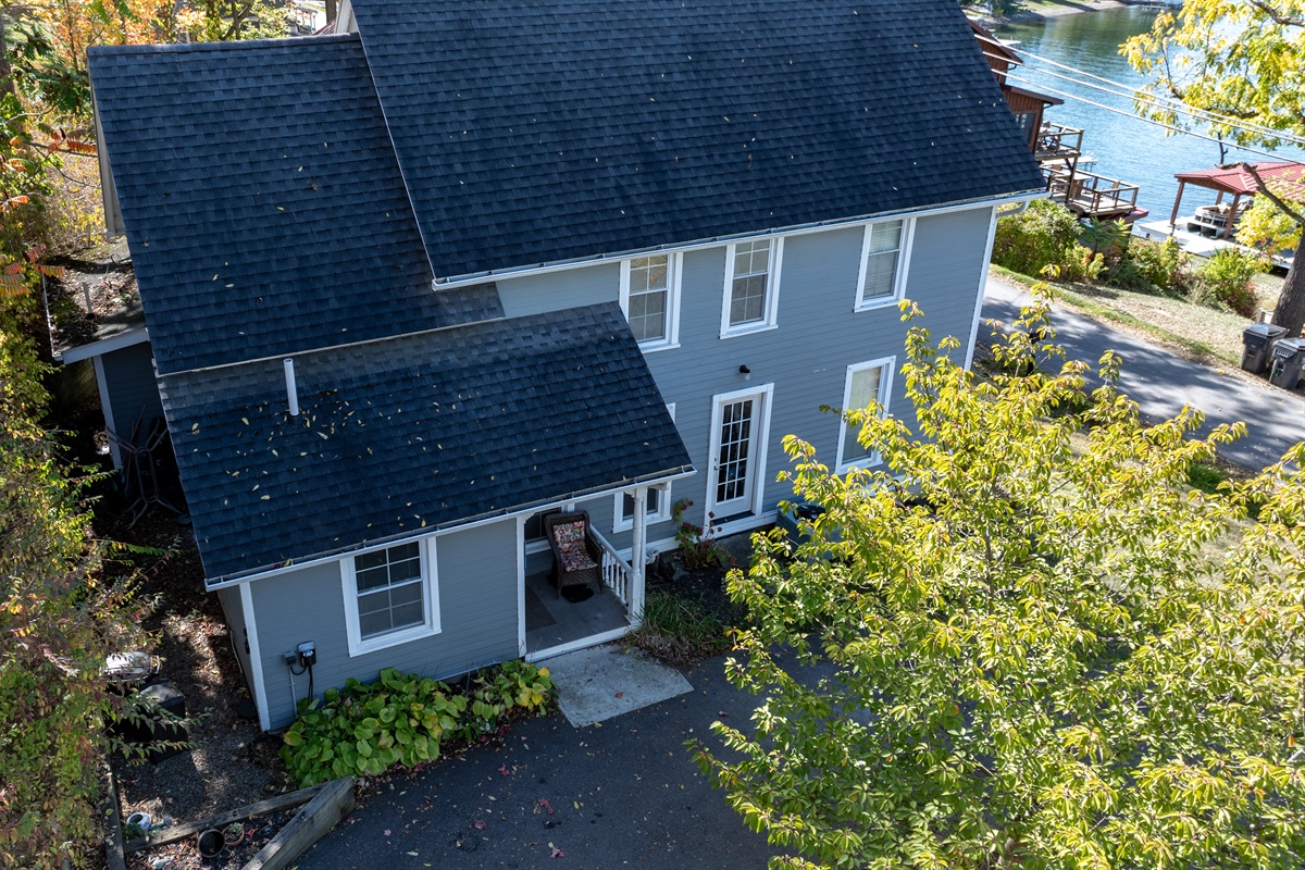 Experience comfort and style in this multi-story lake house surrounded by trees and tranquility