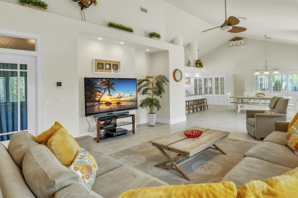 Bright living room with comfortable seating – AMI Beach House, Holmes Beach