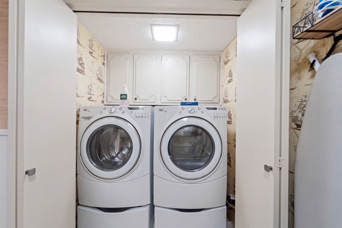 High efficiency washer and dryer with detergent and dryer sheets provided initially.