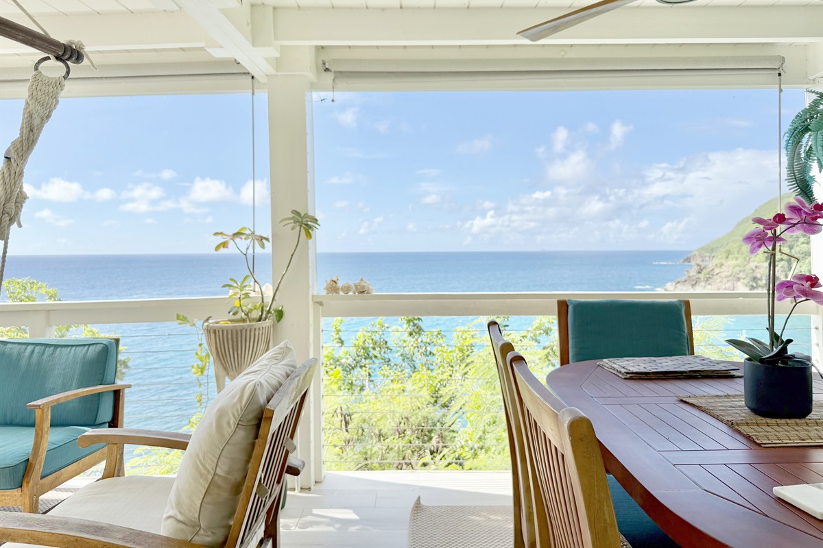 Open dining area with views of the Caribbean Sea.