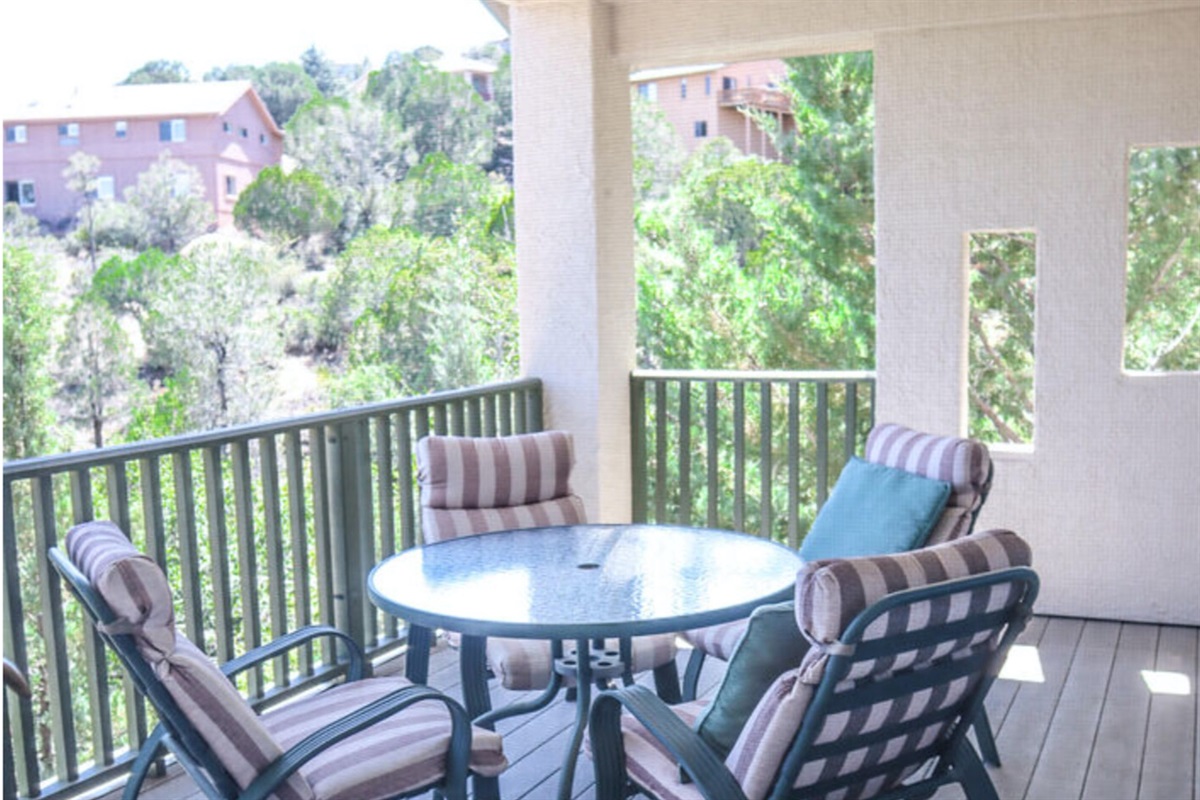 Upstairs deck with seating for your morning coffee.