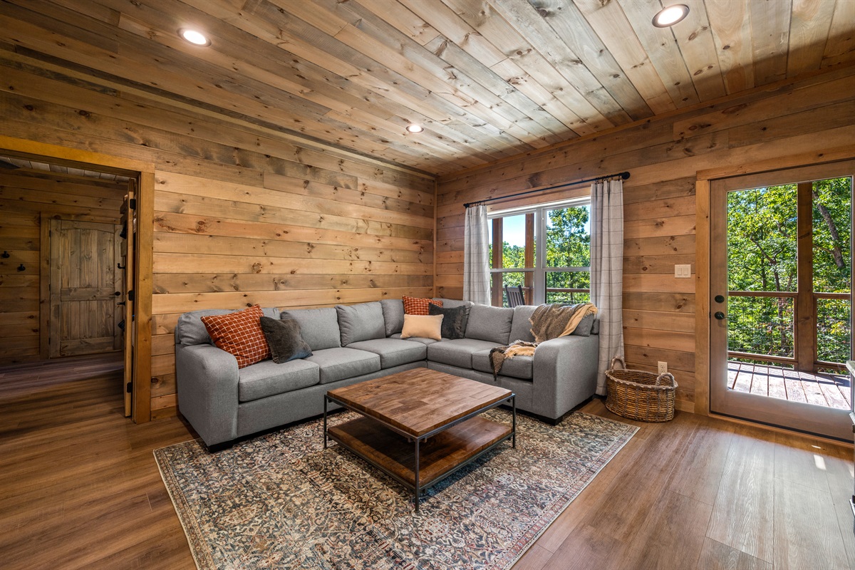 Large sectional for watching movies or games on the gib screen TV. 